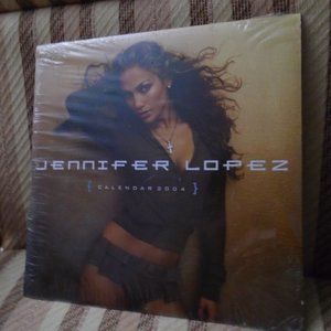2004 JENNIFER LOPEZ, 12 MONTH CALENDAR/PHOTOS, NEVER USED/SEALED. STUNNING!!!